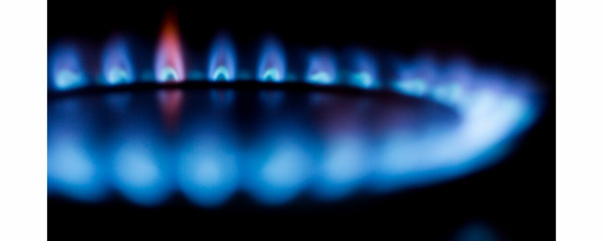 Blue Flames burn on a burner simulating calories