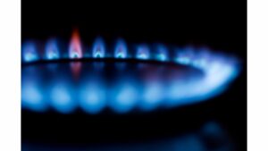 Blue Flames burn on a burner simulating calories