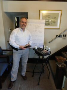 A picture of Doctor Dana presenting Kinesiotape and Graston 1t 1934